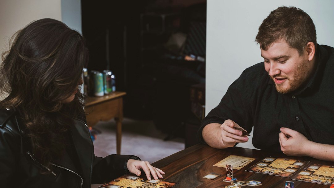 people playing board games